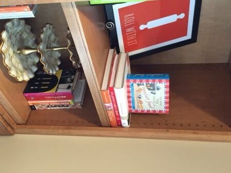 kitchen shelves with cookbooks