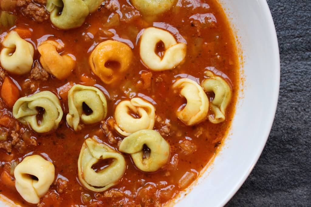 Italian Beef Tortellini Soup is made with jarred marinara sauce and lean ground beef. Tricolored tortellini make it super kid-friendly too! 
