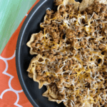 Ground Beef skillet nachos make an easy weeknight meal ready in less than 30 minutes and packed with healthy foods like lean beef and veggies.