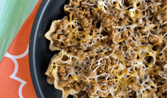 Ground Beef skillet nachos make an easy weeknight meal ready in less than 30 minutes and packed with healthy foods like lean beef and veggies.