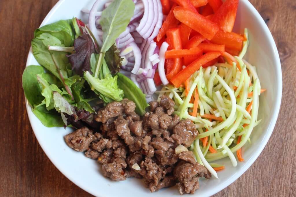 Thai Beef Salad pairs a spicy peanut sauce with fresh veggies and lean ground beef to make on easy weeknight meal