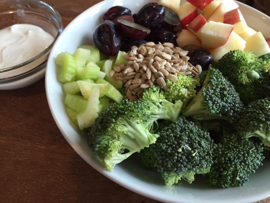 IMG_3498 - Mom to Mom Nutrition Traditional broccoli salad is made with fresh fruit, crunchy vegetables, and sunflower seeds and topped with a sweet and savory Greek yogurt dressing.