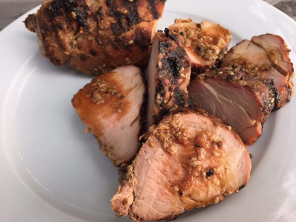 Easy grilled pork tenderloin, marinated in soy sauce, ginger, garlic and sesame seeds, and grilled to perfection! 