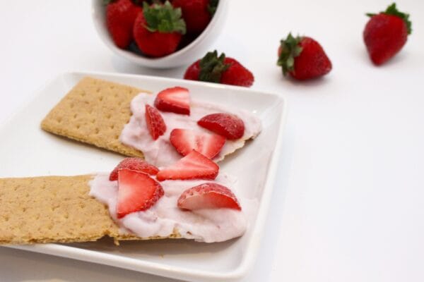 Snacking just got sweeter and healthier with strawberry shortcake dippers. Strawberry yogurt and graham crackers make one simple, kid-friendly snack that tastes just like strawberry shortcake!