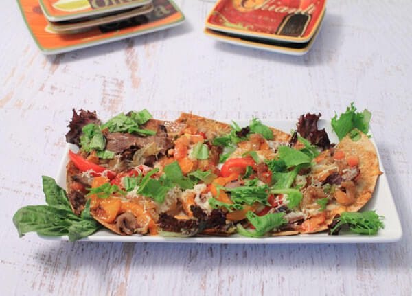 Philly Cheesesteak Flatbread is a healthier spin on the traditional Philly Cheesesteak Sandwich. Loaded with veggies and plated on a flatbread, you’re family will come back for seconds!
