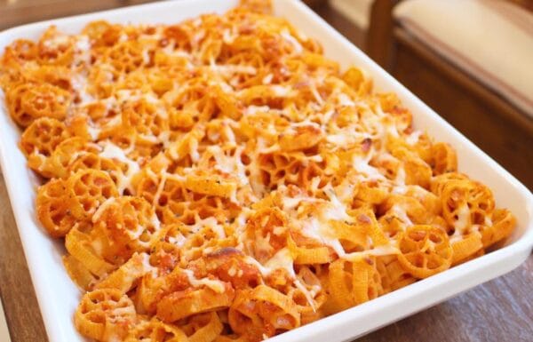 Wagon Wheel Pasta Bake is a quick and easy make ahead meal that is perfect for dinner and reheated for lunch the next day! A true cook once dine twice meal.