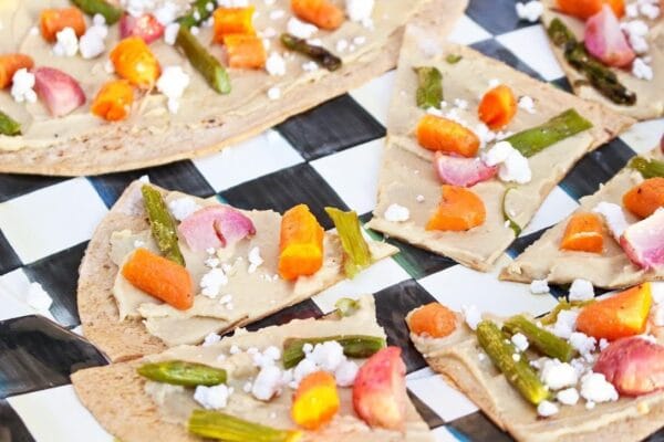 Roasted Vegetable and Hummus Flatbread makes an easy after-school snack that's customizable based on your family's favorite roasted veggies! 