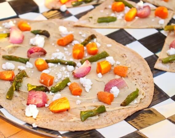 Roasted Vegetable and Hummus Flatbread makes an easy after-school snack that's customizable based on your family's favorite roasted veggies! 
