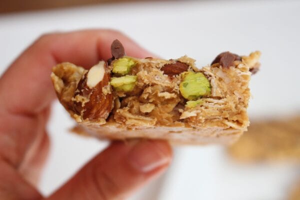 No Bake Nut Lover’s Bars are a combination of smooth peanut butter and chopped nuts, packed with healthy fats and protein, and topped with a drizzle of hazelnut spread.