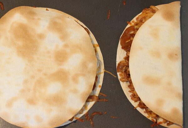 Fresh pineapple, BBQ sauce, and shredded chicken come together to make one easy weeknight meal with these Hawaiian BBQ Chicken Quesadillas. 