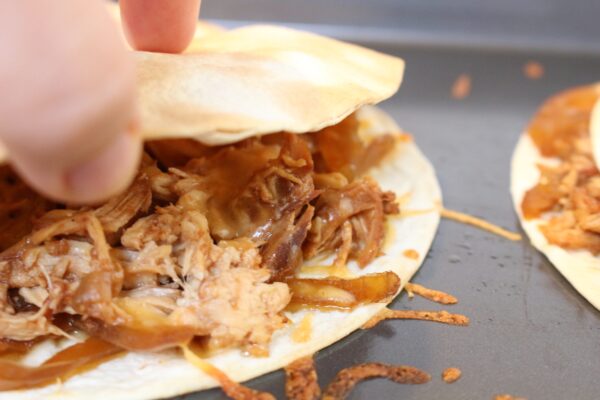 Fresh pineapple, BBQ sauce, and shredded chicken come together to make one easy weeknight meal with these Hawaiian BBQ Chicken Quesadillas. 