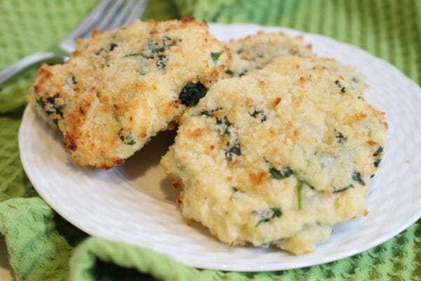 Make the most of leftover mashed potatoes by making baked mashed potato cakes. Mixed with fresh veggies and cheese, they are a unique way to get your kids to eat their greens! 