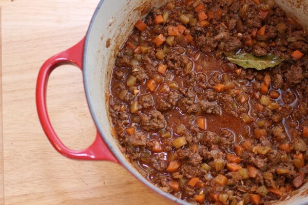 Wow your family with an easy weeknight meal [and get your kids to eat their veggies] with this simple beef Bolognese sauce.