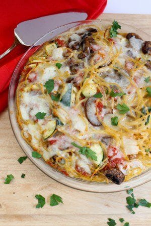 Spaghetti pie is a kid-friendly, calorie-friendly pasta dish baked right in pie dish. Be sure to toss the spaghetti with your family’s favorite pasta add-ins, such as fresh veggies, before baking.