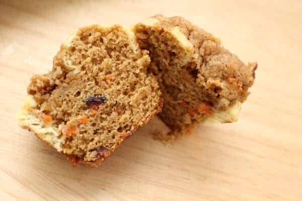 Carrot Pumpkin Cheesecake Muffins are moist, flavorful muffins filled with flavors of the fall and a few simple ingredients like shredded carrots, cream cheese, and pumpkin bread mix.