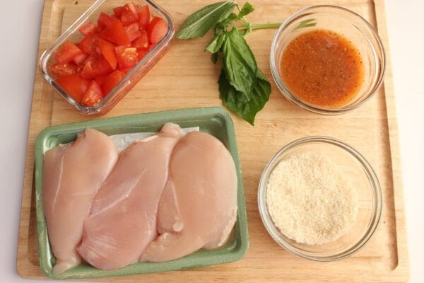 Baked bruschetta chicken breasts are lightly breaded in crunchy panko breadcrumbs and topped with the classic mixture of fresh tomatoes, basil, and garlic.