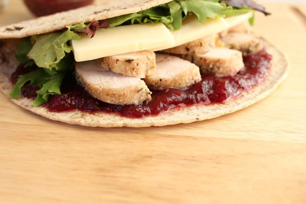 IMG_2099 - Mom to Mom Nutrition The flavors of Thanksgiving leftovers come together with Flatout Flatbread to make one delicious turkey, cranberry and white cheddar sandwich.