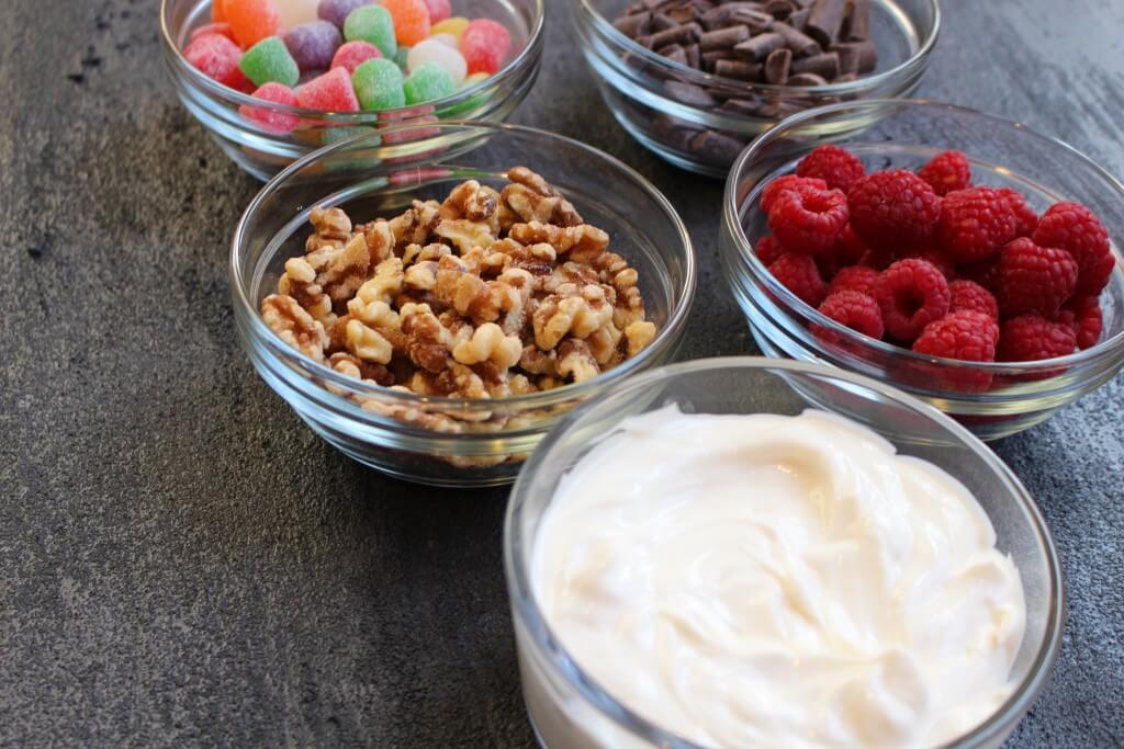 IMG_2241 - Mom to Mom Nutrition A build your own yogurt parfait bar is the perfect dessert for any holiday celebration or special event you might be hosting. Yogurt is layered between sweet indulgences and healthy treats and the best part is every guest can make their own!