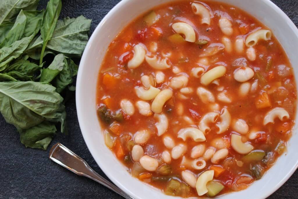 Toss fresh veggies, Italian seasonings and beans in the slow cooker to make one hearty and flavorful slow cooker minestrone soup!