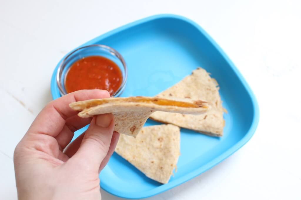 A White Bean Quesadilla makes a simple and nutritious lunch--- a serving of whole grains, dairy, and protein is the perfect mix of fuel kids and parents need to get through a busy day! 
