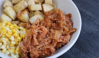 BBQ Chicken Bowls with slow cooked BBQ chicken, onions, roasted potatoes and corn make a simple make-ahead meal that are easily reheated for any busy weeknight.