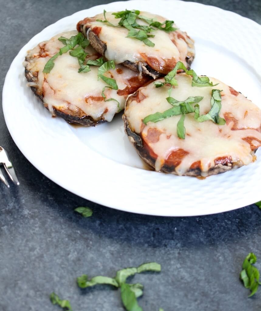 Lighten-up pizza night and make portobello mushrooms “pizza crust” with these quick and healthy Pizza Stuffed Mushrooms.