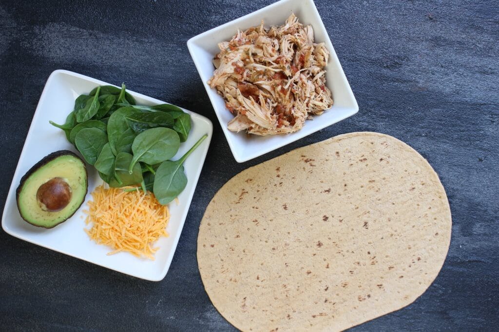 With the help of your slow cooker and the tasty flavor combinations of salsa and ranch, these Salsa Ranch Chicken Wraps make a simple lunch or dinner the whole family can enjoy!