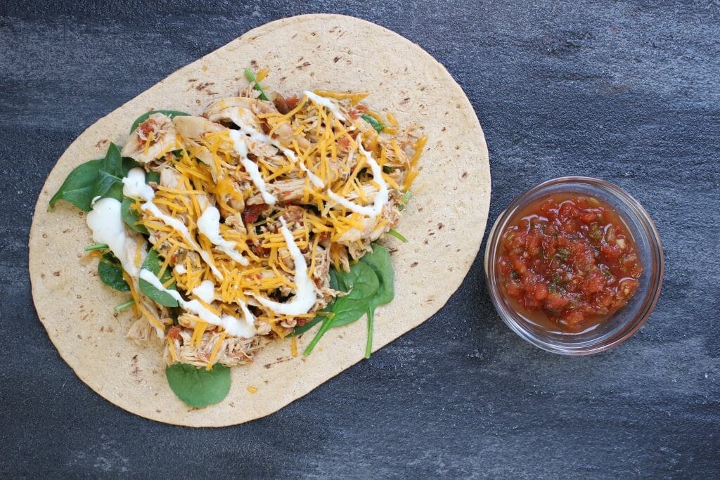 With the help of your slow cooker and the tasty flavor combinations of salsa and ranch, these Salsa Ranch Chicken Wraps make a simple lunch or dinner the whole family can enjoy!