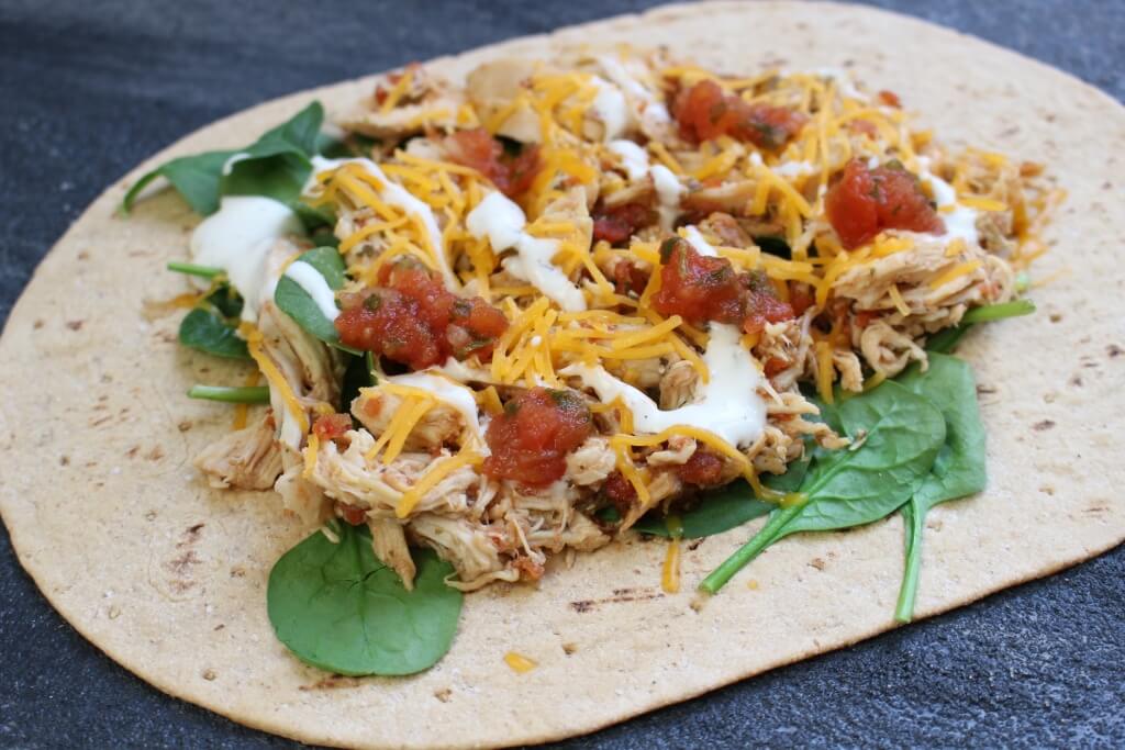 With the help of your slow cooker and the tasty flavor combinations of salsa and ranch, these Salsa Ranch Chicken Wraps make a simple lunch or dinner the whole family can enjoy!