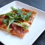 Fig, Prosciutto, and Arugula Pizza is simple yet gourmet! Wow your family on pizza night with this delicious and unique flavor combination.