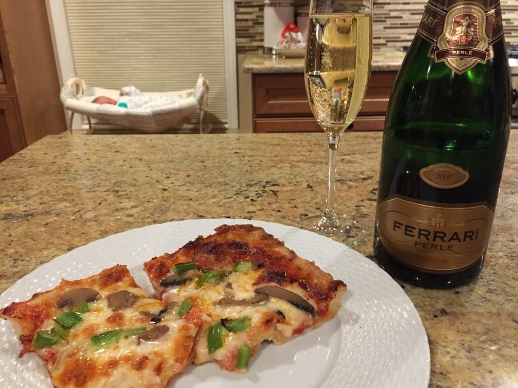 Our post-baby meal: Pizza! Or so that's what it's been with the boys. We shall see what little sis feels like [I'm sure the champagne will stay the same]. 