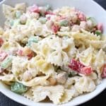 Chickpea Pasta Salad is a fresh and flavorful dish packed with protein, chopped veggies, and whole grain pasta.