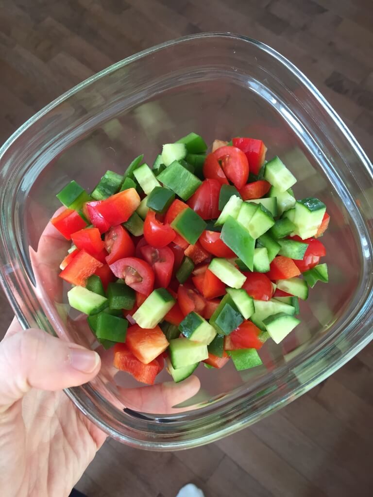 I typically chop the topping for this hummus dip on the weekends so I can make the dip as the recipe calls for, or snack on it solo [or with eggs, in wraps, etc.] throughout the week. 