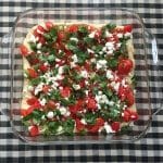 Mexican Layered Hummus Dip is a take on on the traditional party favorite but the base is protein-packed hummus. Topped with colorful, nutritious ingredients, this dip makes a fast snack or flavorful appetizer for any party.