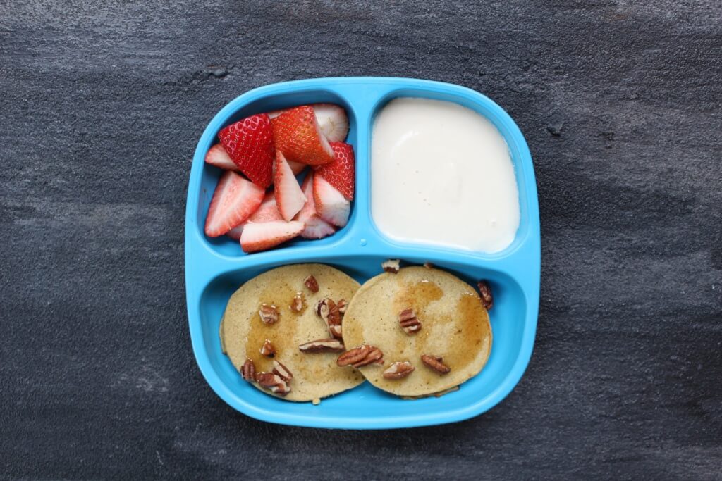 If you’ve had the luxury of making meals for a toddler you’ll quickly appreciate the one constant that comes from creating a toddler feeding routine. Here’s a look at what my toddler eats in a day- from breakfast to dinner and snacks included!