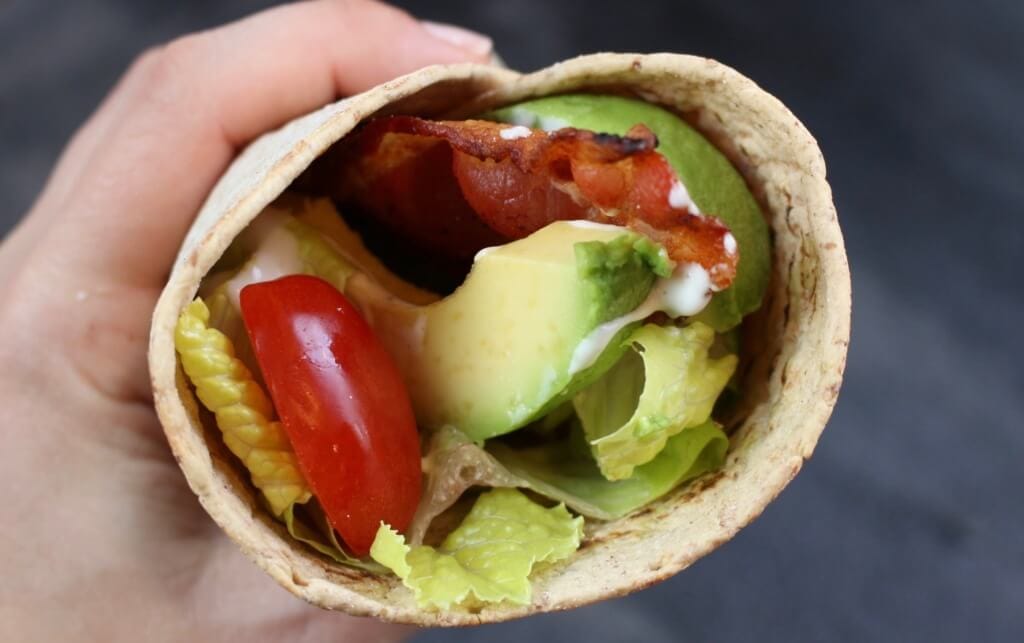 What could be better than a simple bacon, lettuce, tomato, and avocado wrap [BLTA wrap]?! Layered in a Flatout Flatbread this sandwich makes for the easiest lunch!