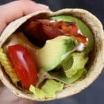 What could be better than a simple bacon, lettuce, tomato, and avocado wrap [BLTA wrap]?! Layered in a Flatout Flatbread this sandwich makes for the easiest lunch!
