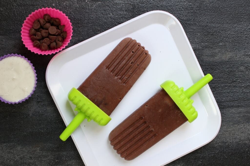 Homemade Fudgsicles are made with simple store-bought ingredients and packed with tons of flavor thanks to chocolate pudding and Greek yogurt!