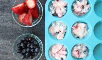 Frozen yogurt fruit cups are a fun cup-sized Greek yogurt and fruit snack that make a great alternative frozen sweet treat to popsicles or ice cream!