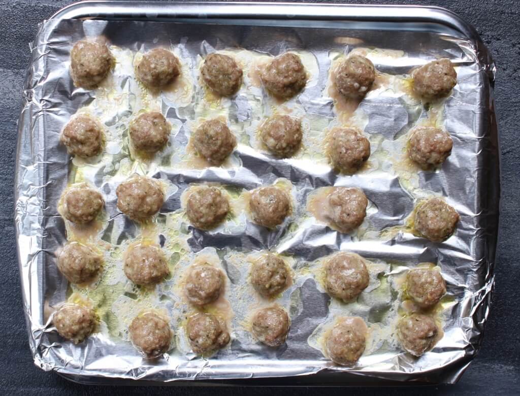 Turkey Pesto Meatballs are made with just four ingredients and make the perfect healthy protein for meatball subs or served with marinara and whole grain pasta for a simple weeknight meal. 