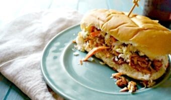 Slow Cooker Mexican BBQ Chicken Sandwiches: 3 unlikely ingredients come together with almost no prep to create one out of this world slow cooker meal!