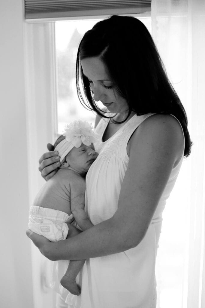 Just so you see I haven't totally let myself go, here's a sneak peak at one of the photos from Lily's newborn photo session! I'm showered, hair is done, makeup is on! But sweet Lily still looks 1,000 times better. I hope to share more family photos from the session soon!