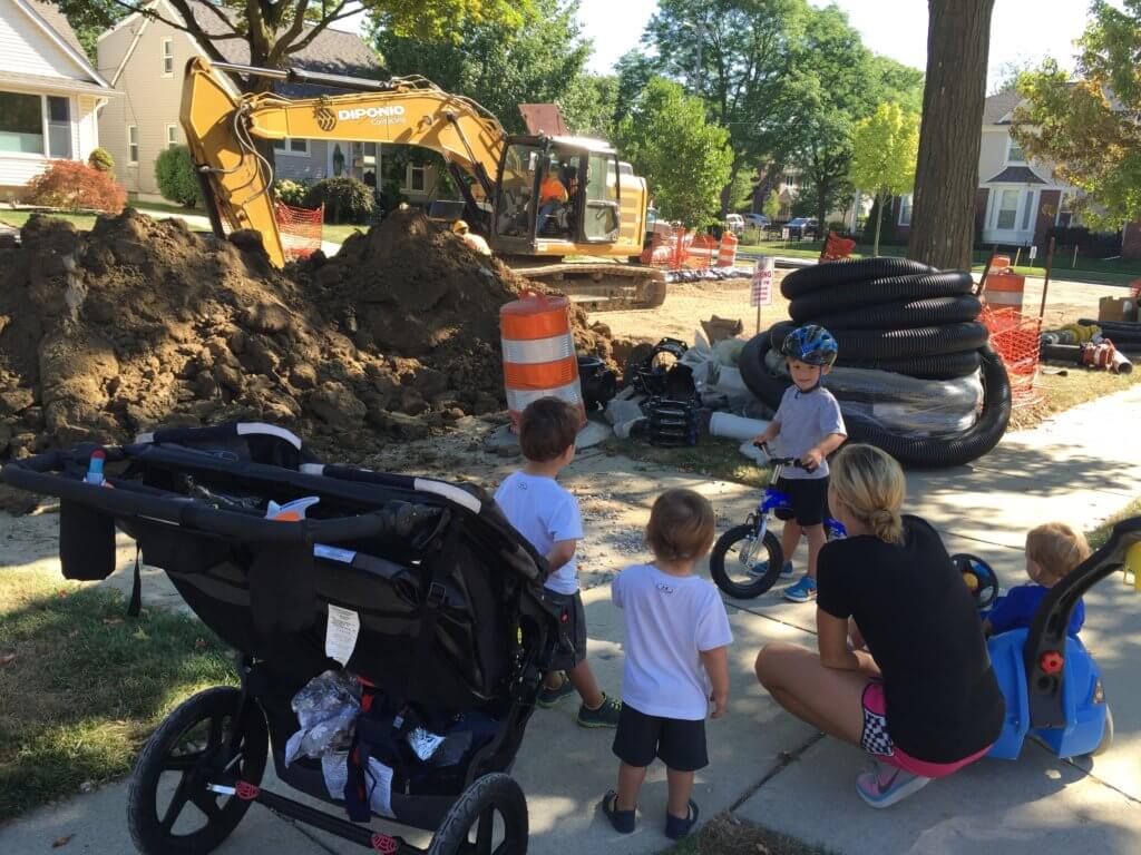 And when we have our fill of the park, we watch construction with friends! Not pictured: sweat-soaked Mom and sleepy Lily [in the carrier]. 