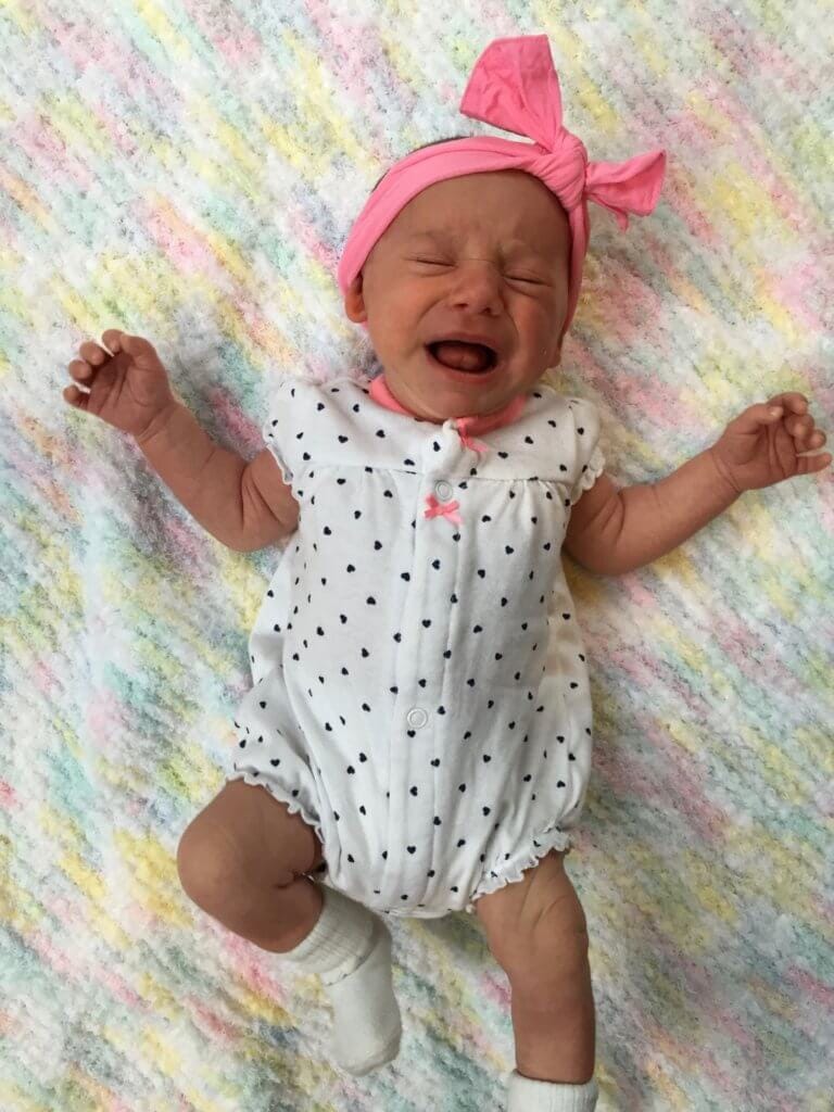 Here's Lily, one month old, when we first introduced the bottle. As you can see she wasn't a happy camper! 