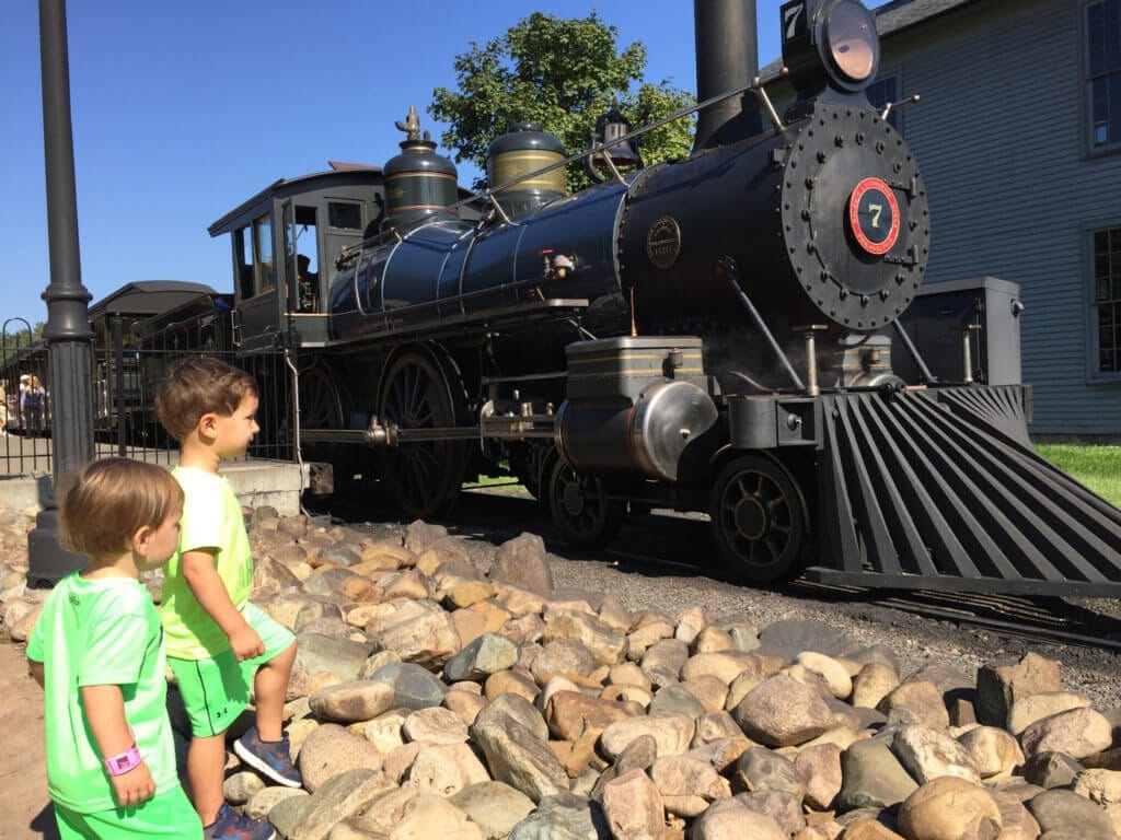 Hanging with his best bud doing their thing... walking and talking about trains! 