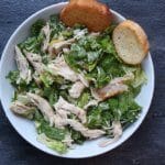 Rotisserie Chicken Caesar Salad is made by a pre-cooked rotisserie chicken, making dinner extra easy and fast! Plus this recipe comes with a simple, homemade Caesar salad dressing.