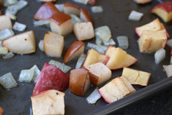 Bring out the delicious flavors of fall with this simple side dish of oven-roasted apples, pears, and onions. 