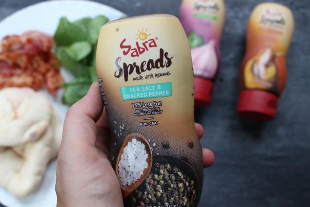 BLT Pita Pockets pack a punch of flavor for a quick and easy classic bacon, lettuce, and tomato sandwich with a simple hummus spread. Great for a quick school or work lunch!