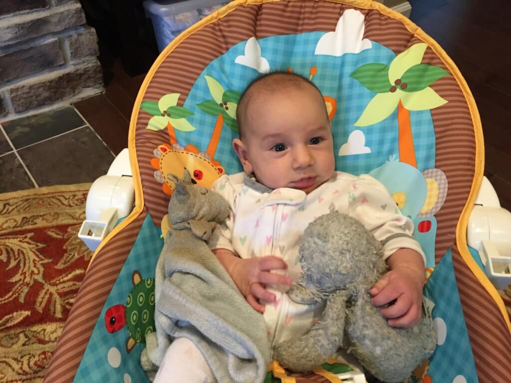 And here's little sis hanging out with the boy's favorite toys! Their sheepy's, lovey's, can't live without stuffed animals... sneaky little girl! 