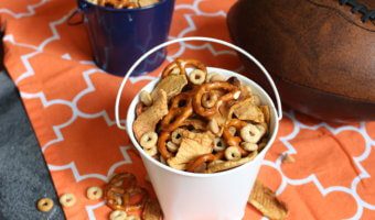 Combine the flavors of fall with this simple, crunchy apple peanut butter Cheerios snack mix. Made with Honey Nut Cheerios, dried apple chips, and peanut butter chips!